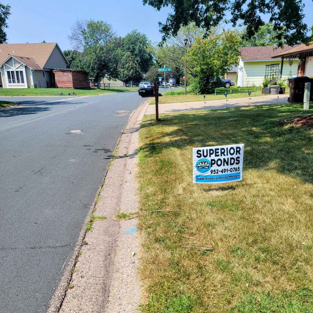 water feature yard sign showcasing superior ponds for discounts