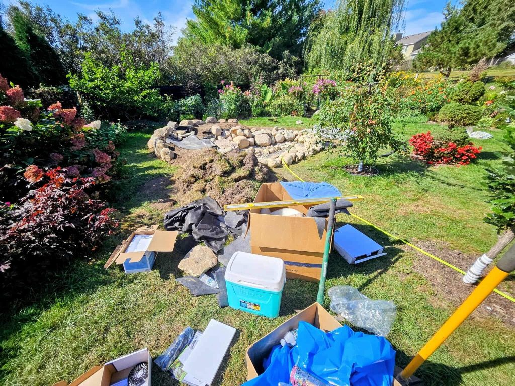 the mess a pond project makes a yard